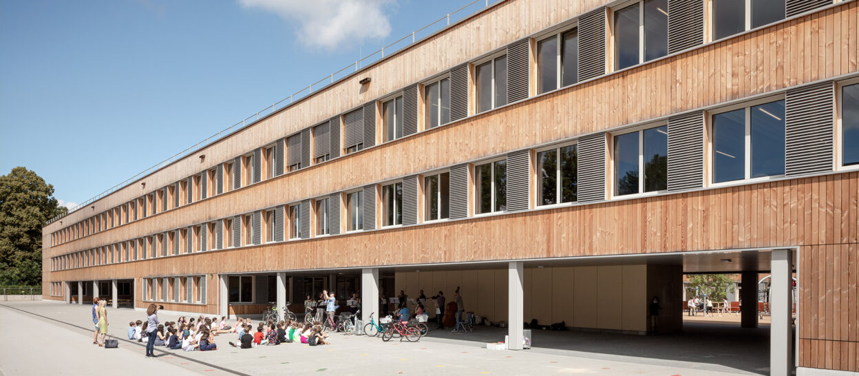 Nachhaltiger Schulbau Schulcampus Adorno Gymnasium Tragwerksplanung Holzbau