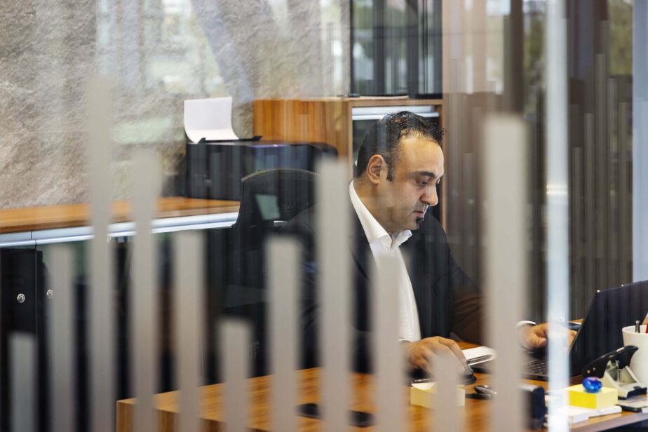Mustafa Alkan from Werner Sobek Istanbul sitting at his desk in the office